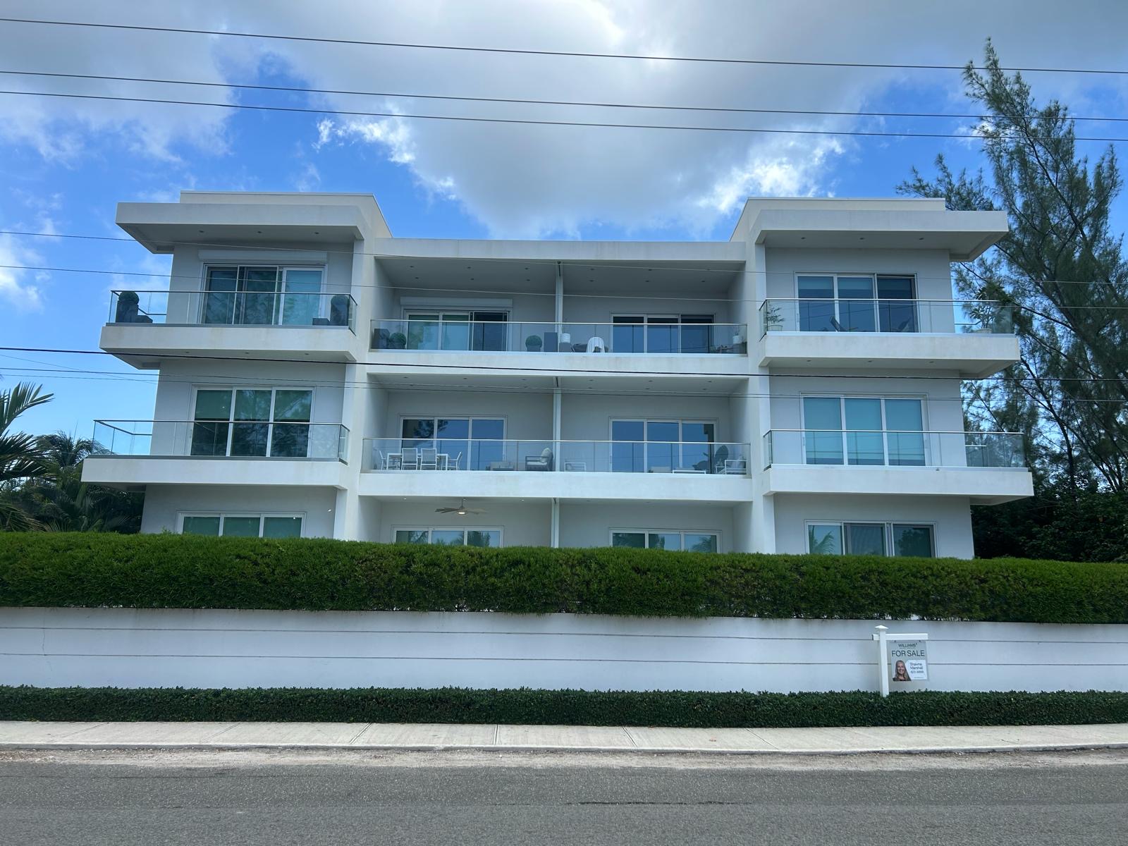 Clean coastal home exterior in Grand Cayman after soft washing