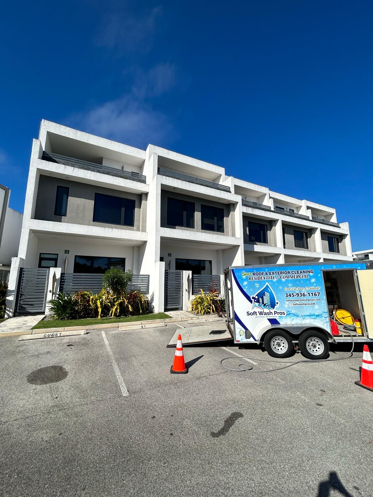 Clean white building home exterior in Grand Cayman after soft washing
